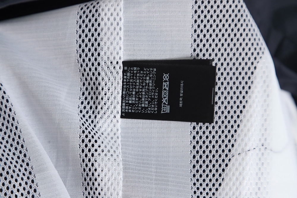 The North Face 23SS 拼色连帽风衣夹克