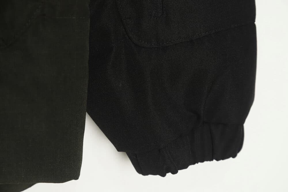 The North Face 拼接撞色大口袋功能风羽绒服 TSK1