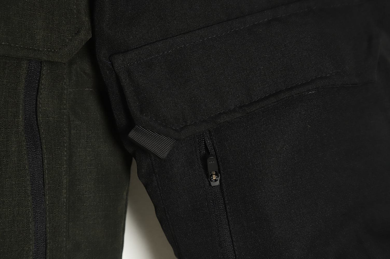 The North Face 拼接撞色大口袋功能风羽绒服 TSK1 The North Face 拼接撞色大口袋功能风羽绒服 TSK1