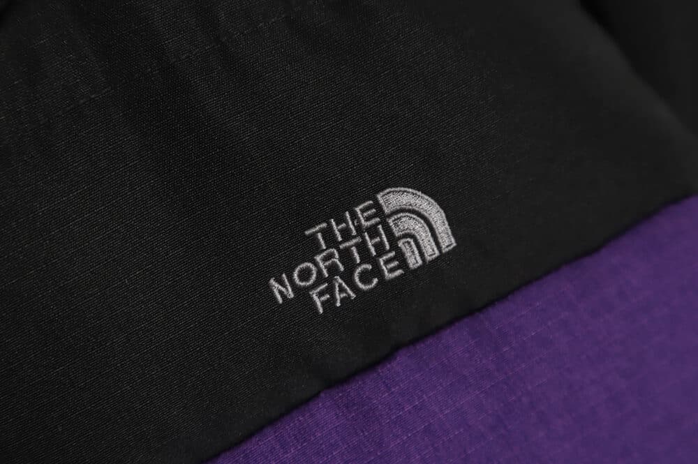 The North Face 拼接撞色大口袋功能风羽绒服